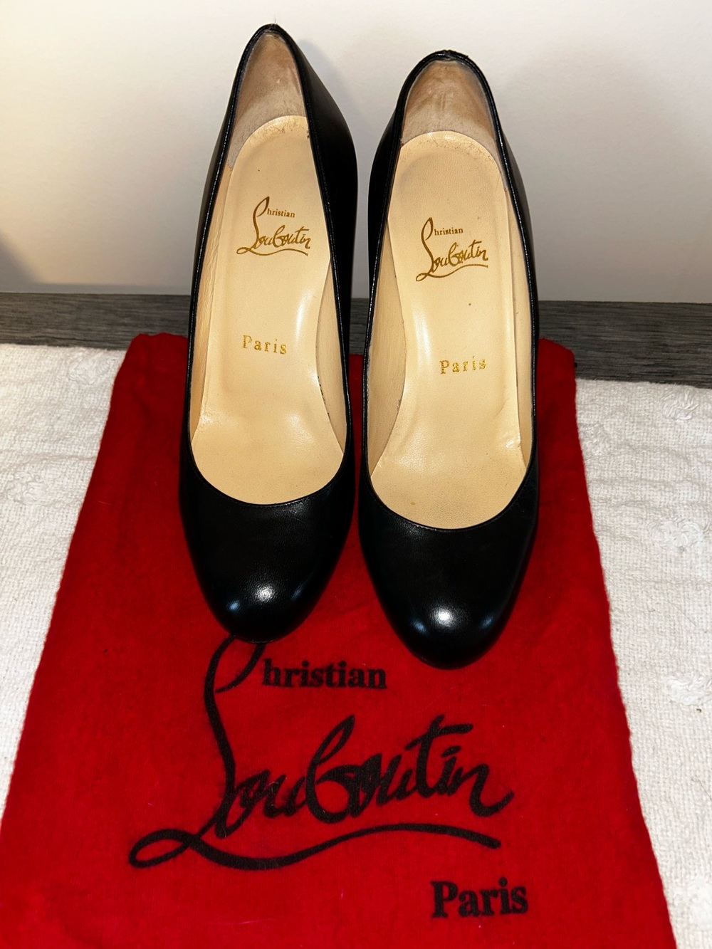 Christian Louboutin Black Leather Round-Toe Pumps